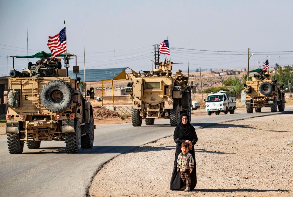 US troops on patrol in the north eastern Syria. (Photo: Delil Souleiman/AFP)